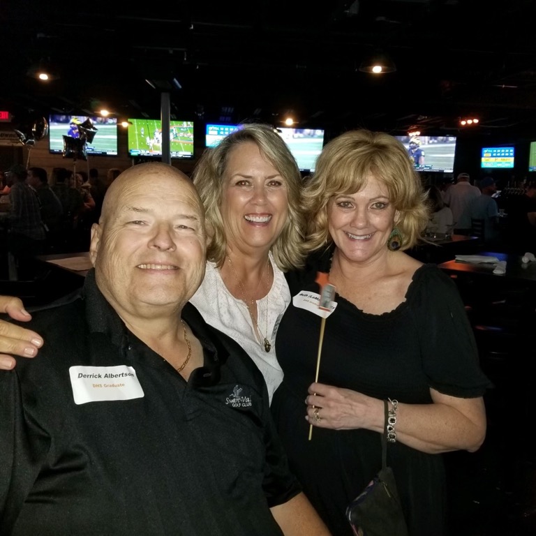 Derrick Albertson, Laurie (Braathen) Bush and Beth (LaMont) Frey having fun at our 46th Reunion. Such beautiful smiles!