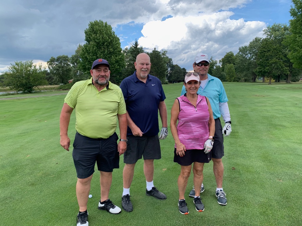 Golf team - Neil Merry, Steve Myer, Valerie (Berry) Winiesdorffer along with hubby Thomas! Another great team!